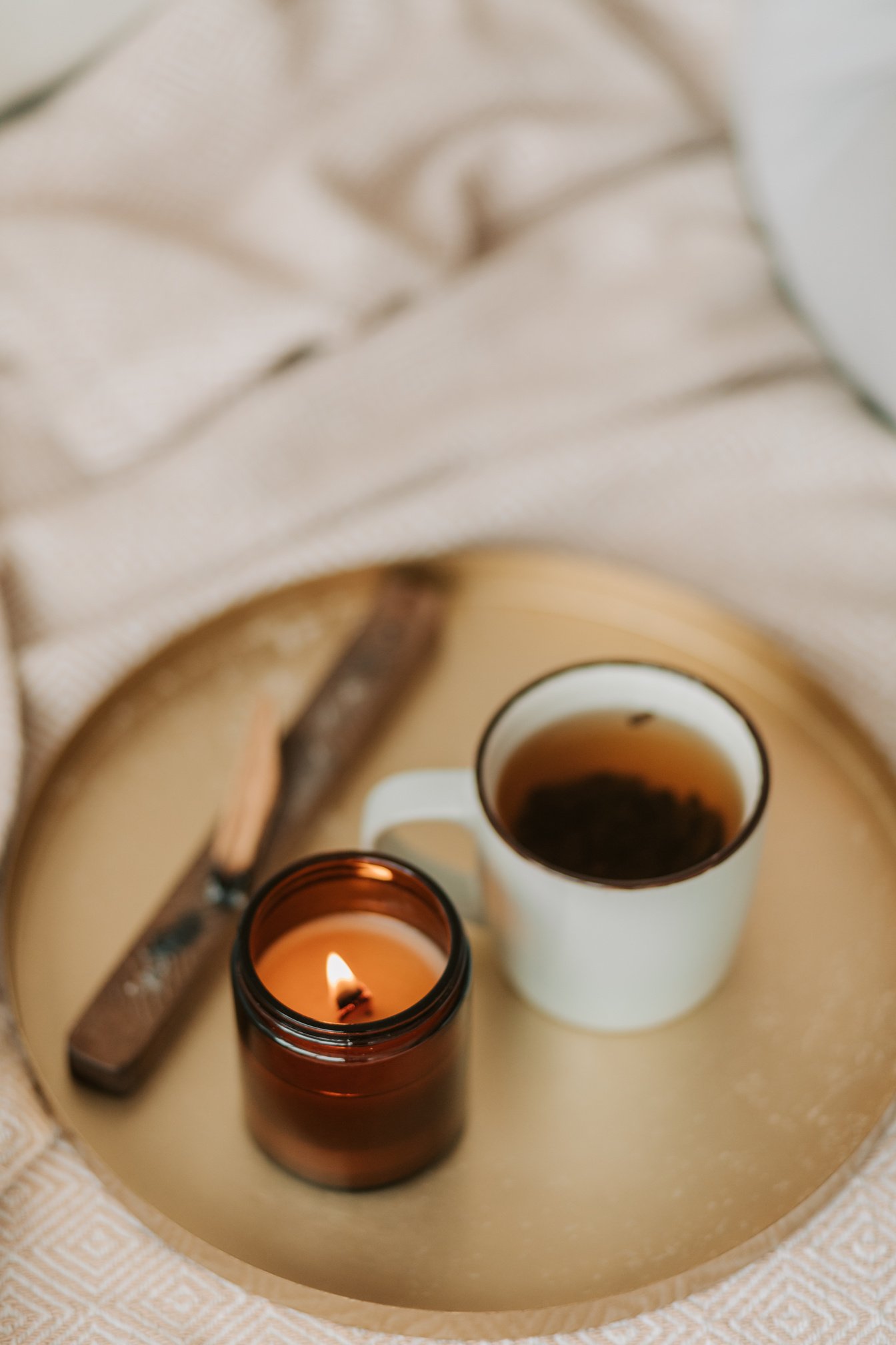 Cup of Tea with Lighted Candle in a Jar